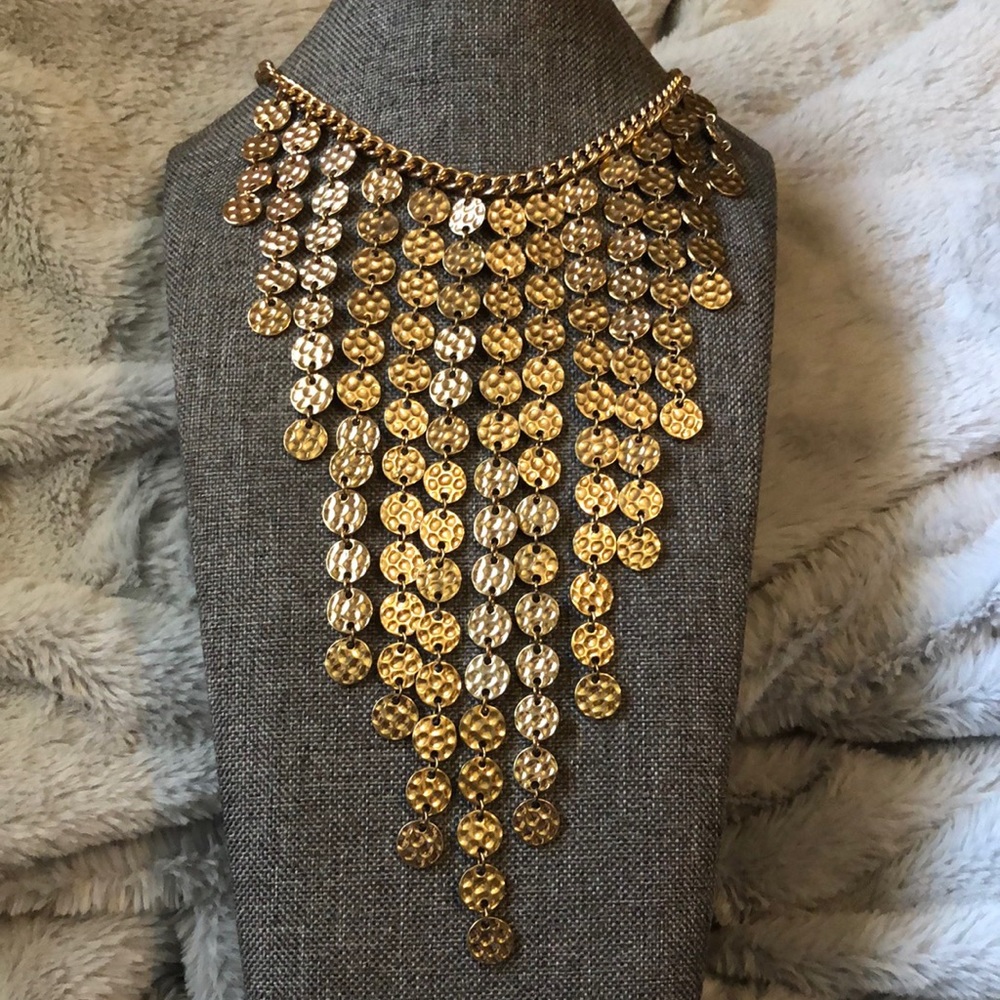 Beautiful and different ALDO necklace in gold tones